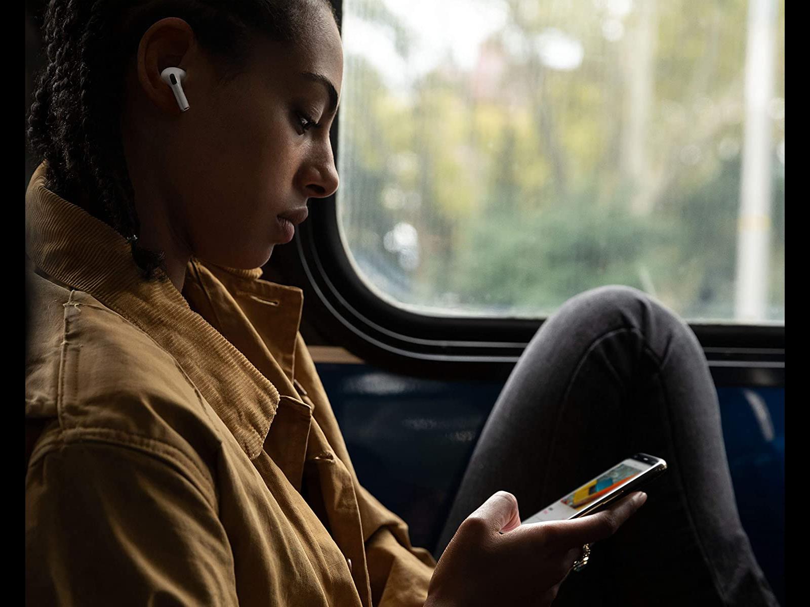 Image shows a person using the Apple AirPods Pro Magsafe 1st Generation