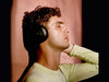 Photo of Nura headphones while listening to music by male