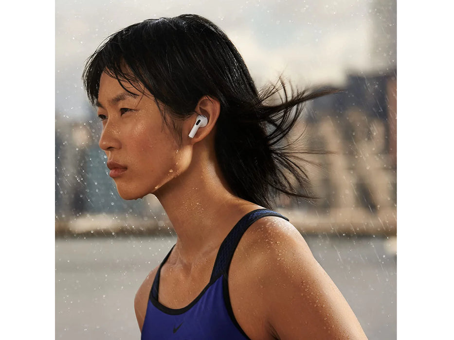 Photo showing a woman running in the rain waterproof headphones