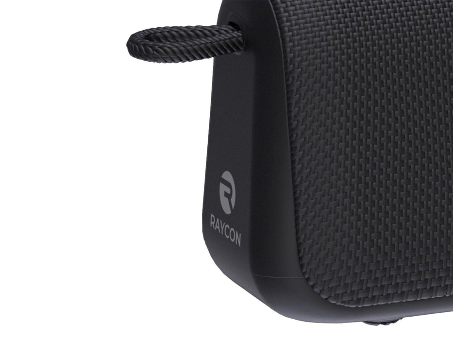 Image shows a close up view on the bottom left corner of the black Raycon Everyday Bluetooth Speaker