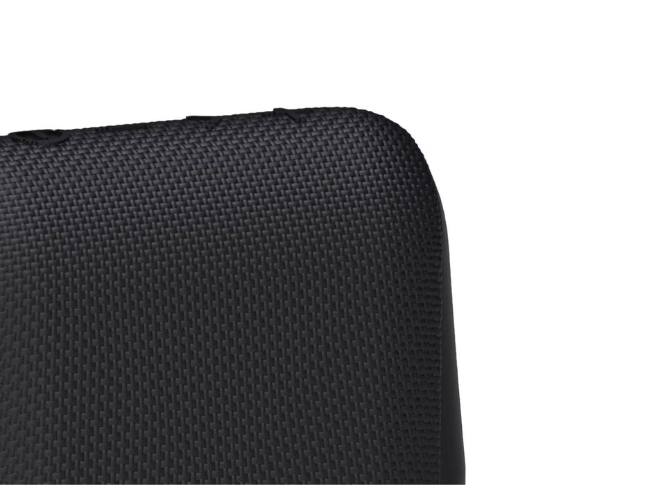 Image shows a close up view of the top corner of the black Raycon Everyday Bluetooth Speaker