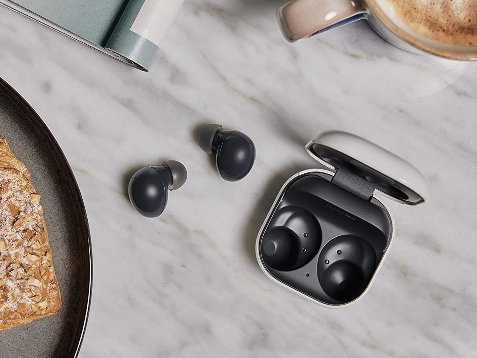 Top view on the Wireless bluetooth Samsung Galaxy Buds2 with Charging Case on table